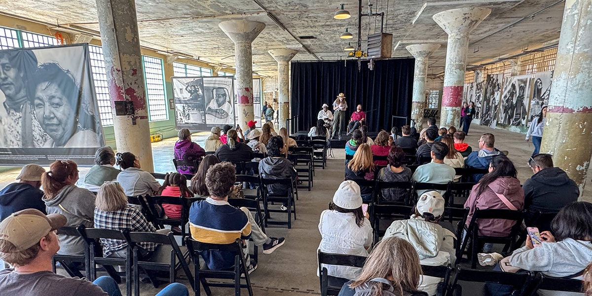 Crowd on Alcatraz Island for a Formerly Incarcerated Speaker Series event.