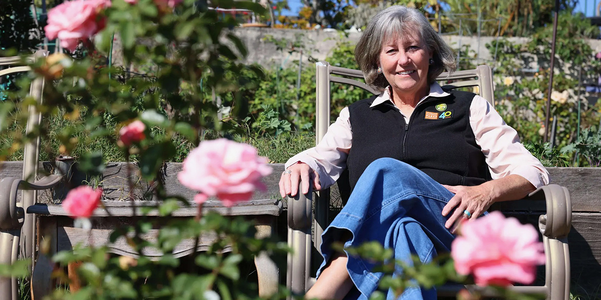 Parks Conservancy CEO Chris Lehnertz sits in the Fort Mason Community Garden