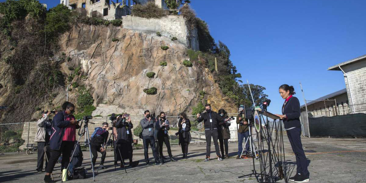 Secretary Haaland addressing the press on Alcatraz Island.