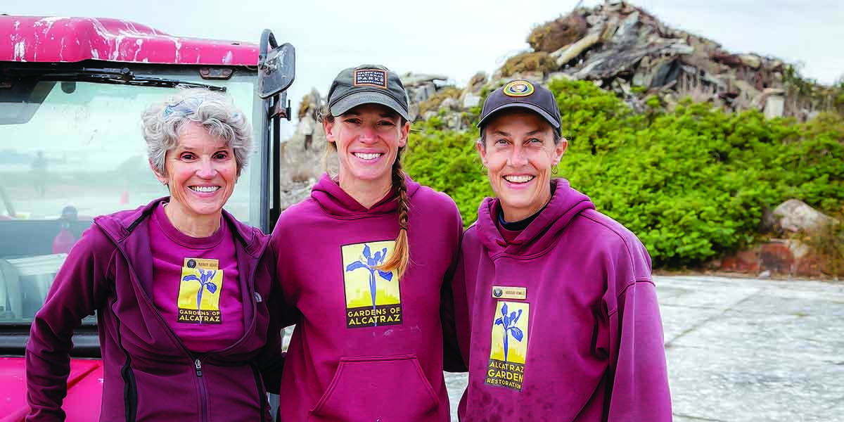 Shelagh Fritz, center, is Program Manager for Alcatraz Historic Gardens at the Parks Conservancy.