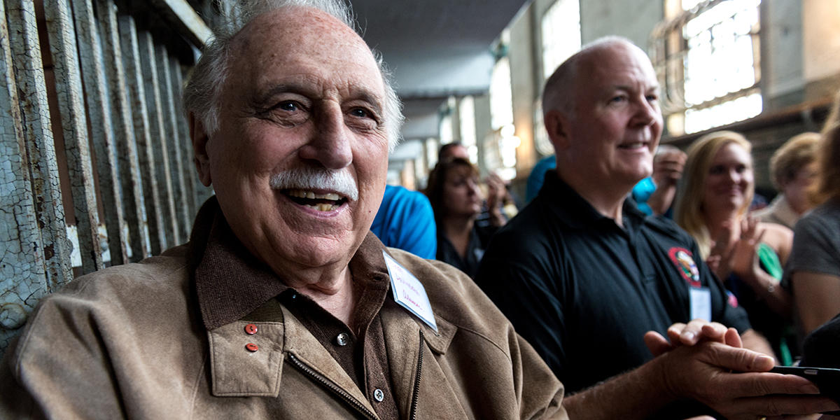 Former Alcatraz guard George DeVincenzi and other alumni participate in a reunion on the island in 2015.
