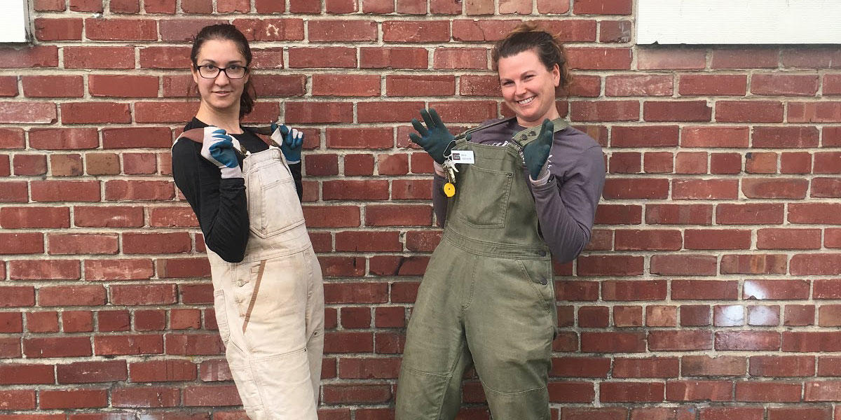 Two Park Stewardship Trail Crew members give big smiles for the camera