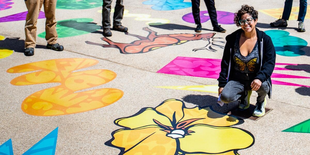 "Ancestral Futurism: Looking Back to Repair the Future" art installation by Favianna Rodriguez