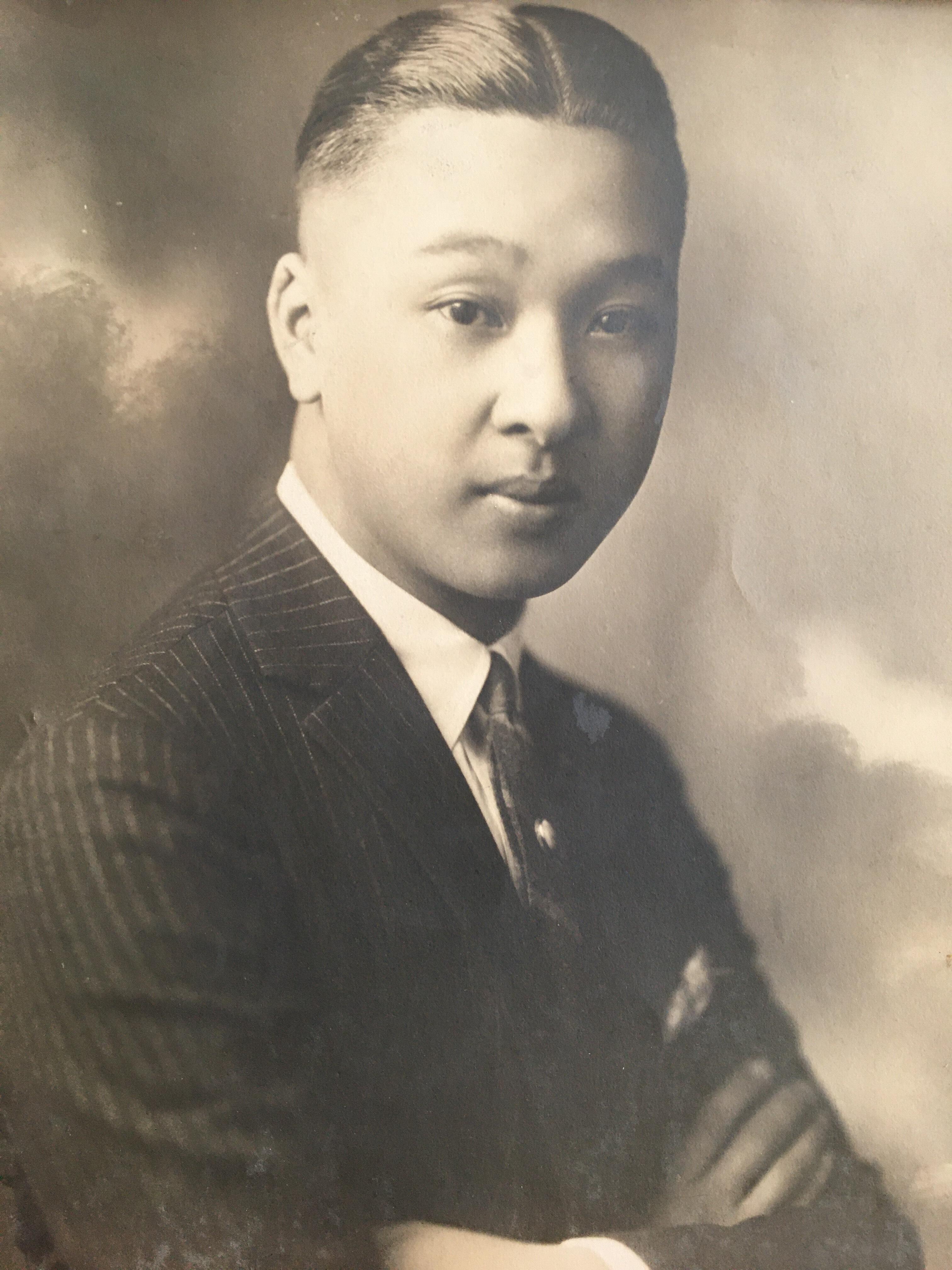 A sepia toned photograph from 1923 of Wallace Fong, a young Chinese-American man.