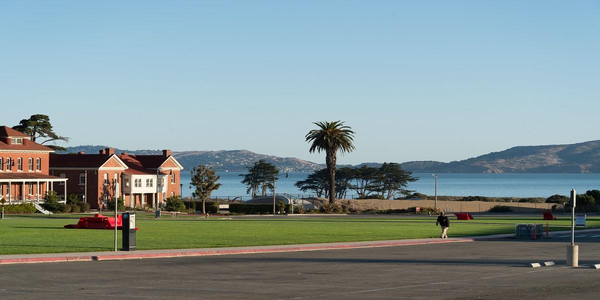 Image of the Presidio Main Post Parade Ground with the Bay in the distance