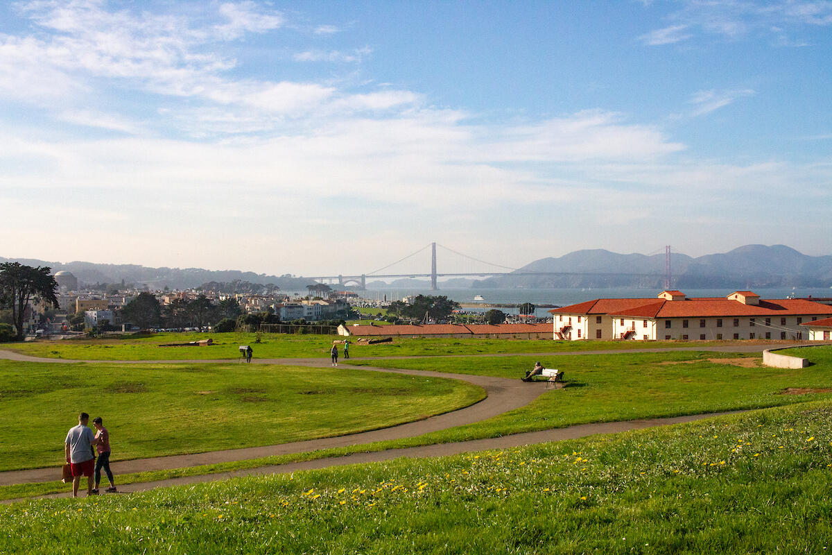 Visitors enjoying the Fort Mason lawn