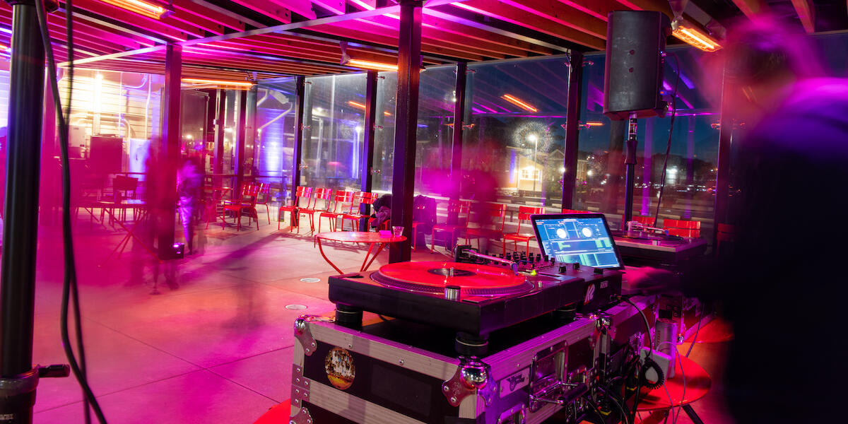 DJ Mancub plays at the Pink Full Moon Party 2023.