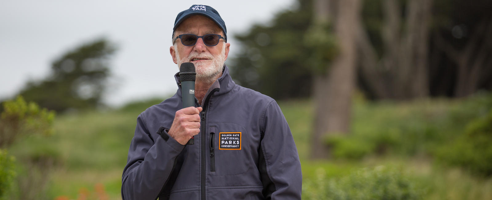 Greg Moore speaking at an event