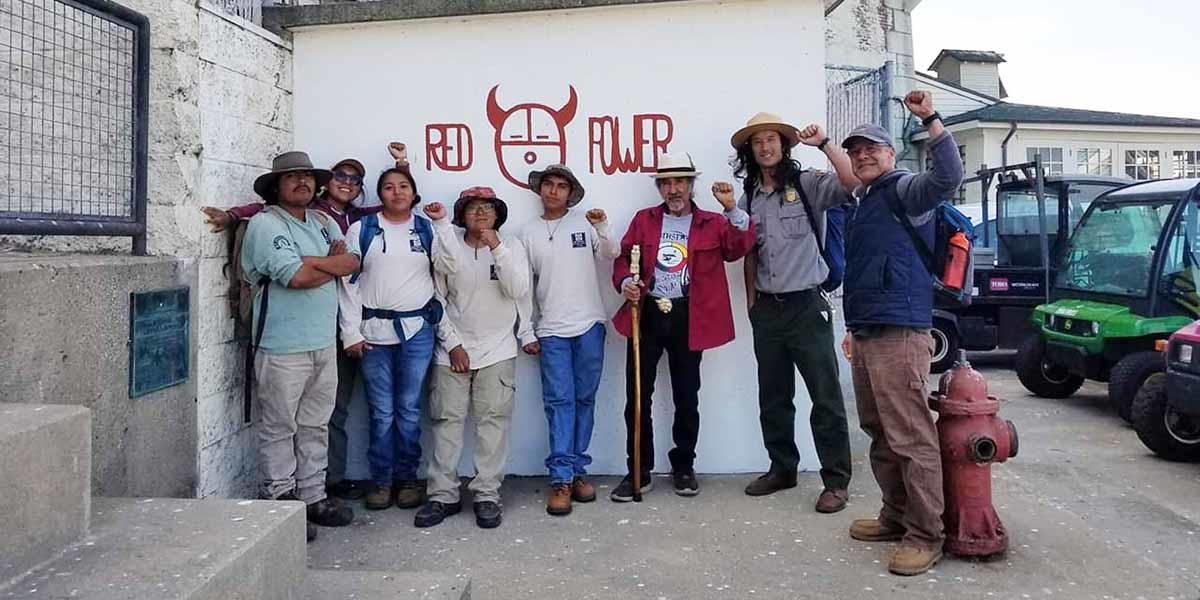 Eloy Martinez, third from right, at an event on Alcatraz.