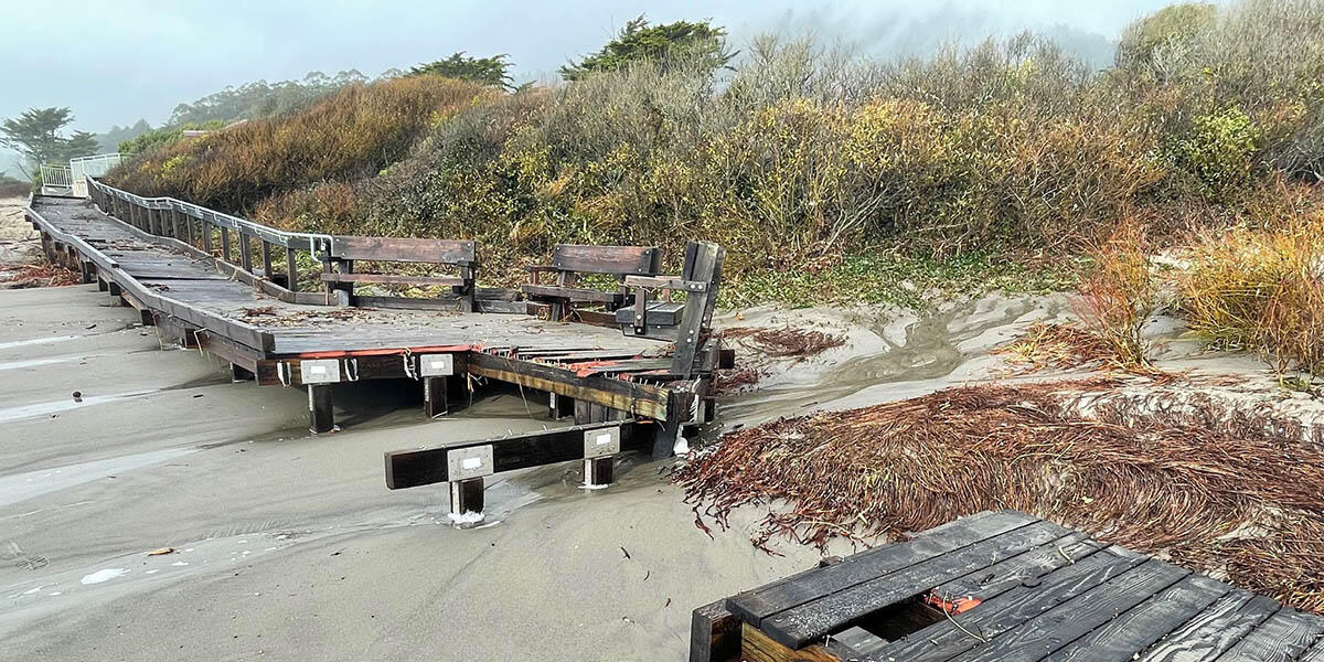 A broken boardwalk is seen at Stinson Beach following storms in early 2023.