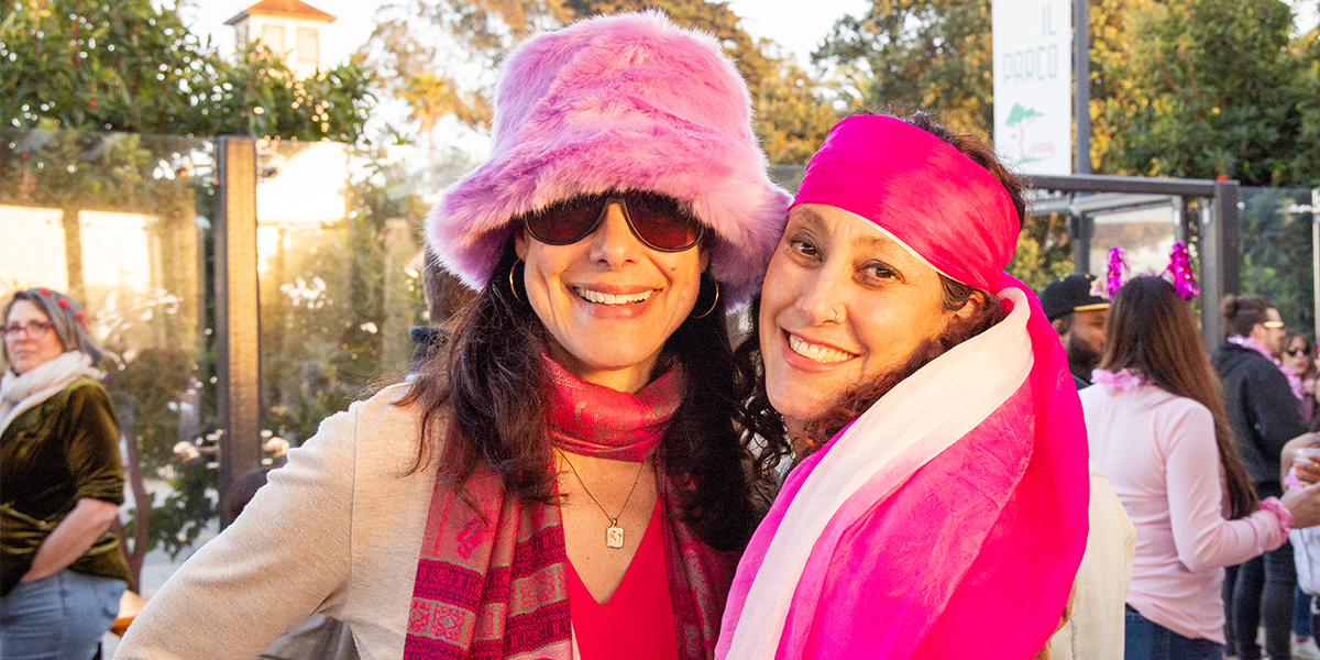 Attendees pose for a photo at Pink Full Moon Party 2025 at the Presidio Tunnel Tops.