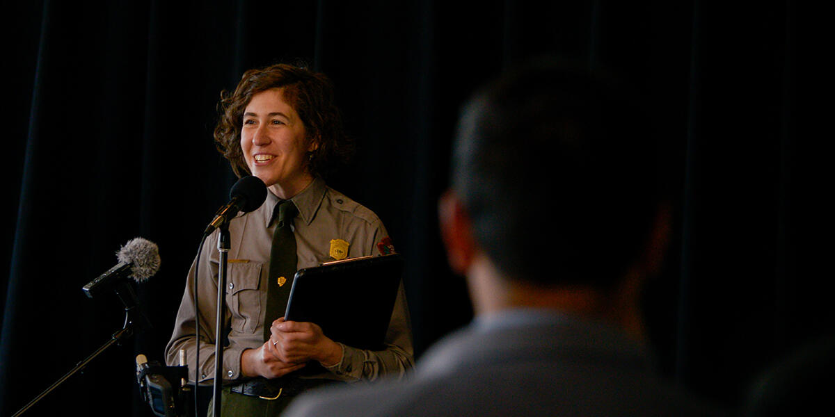 Woman at microphone