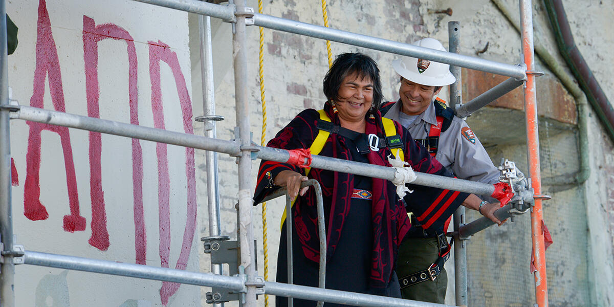 woman's smile shines so bright on alcatraz