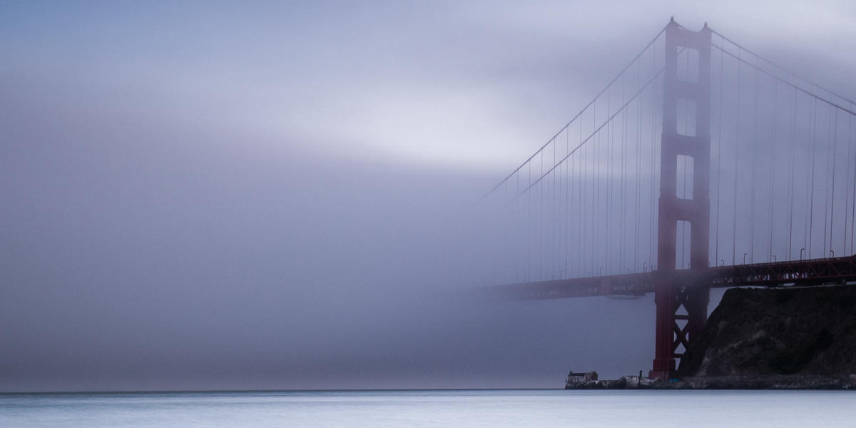 Golden Gate Bridge on a dark foggy day