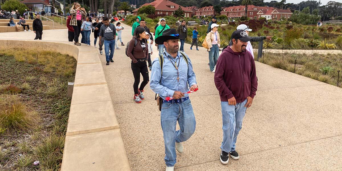 Participants from ALAS (Ayundando Latinos A Soñar) enjoying the "Raíces en la Bahía/Rooted in the Bay" event for farmworkers and their families in September 2024. Activities included crabbing, hiking, and beachside recreation.