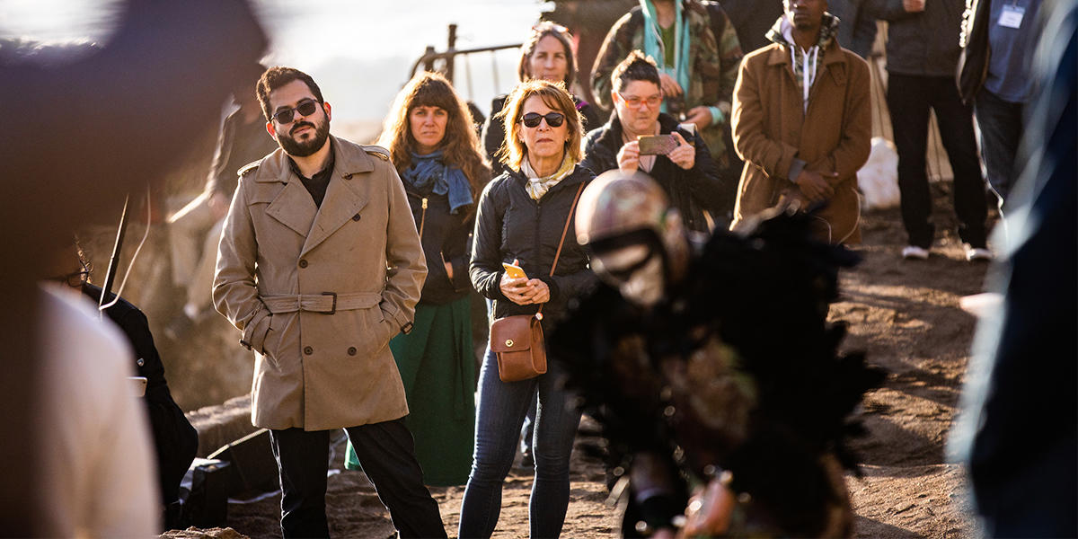 Crowd watches musician Andy Meyerson during "Tremble Staves" performance.