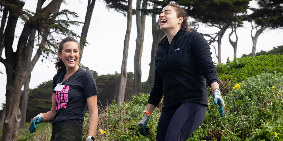 Volunteer laugh on hillside of Lands End.