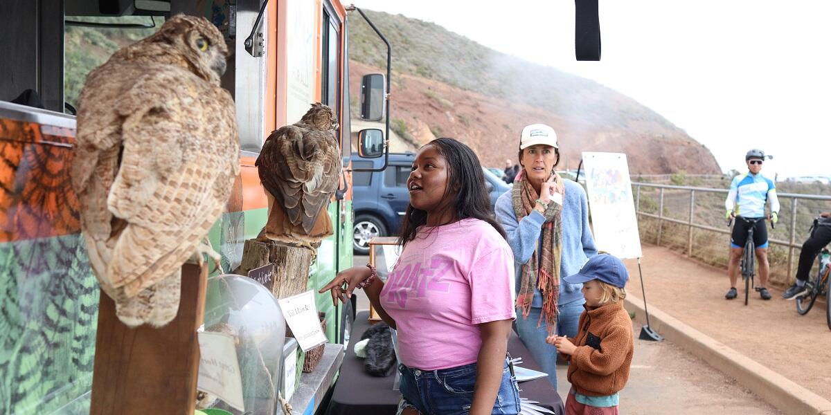 Learning about raptors at Hawk Hill with the Roving Ranger.