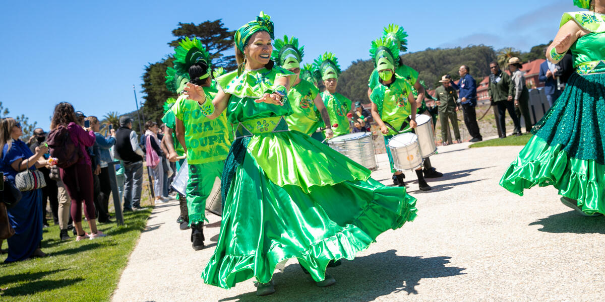Fogo Na Roupa dancers and band parade throughout the Presidio Tunnel Tops.