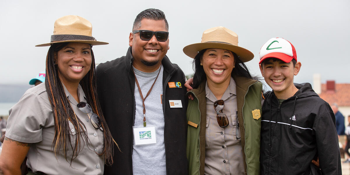 Golden Gate National Recreation Area and Parks Conservancy partners pose for a picture at Presidio Tunnel Tops.