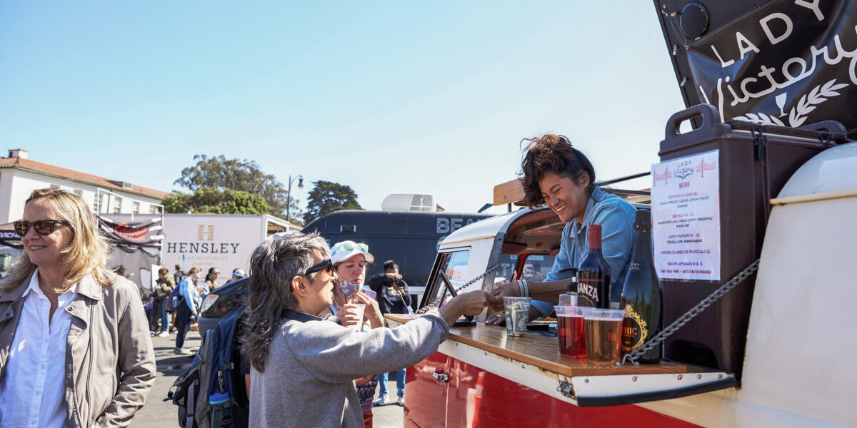 A vendor sells drinks at Presidio Tunnel Tops Opening Day.