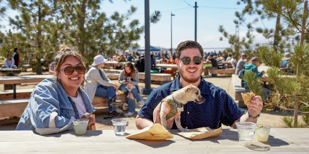 Park visitors enjoying their food at Presidio Tunnel Tops Picnic Place.