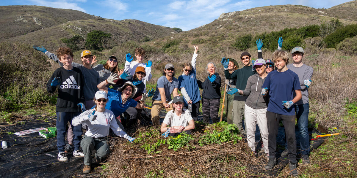 A group of park stewardship volunteers post for a photo at Tennessee Valley
