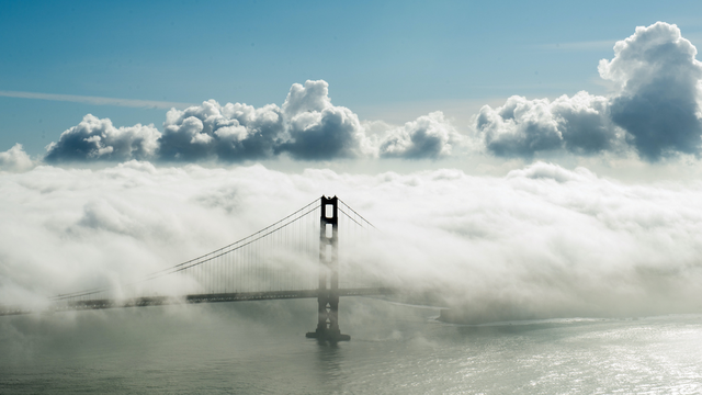A view of the Golden Gate Bridge with its signature fog from the Marin Headlands.