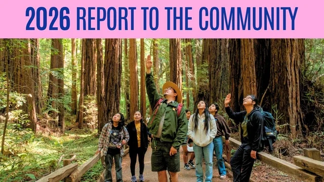 An NPS park ranger leads a community group in Muir Woods.