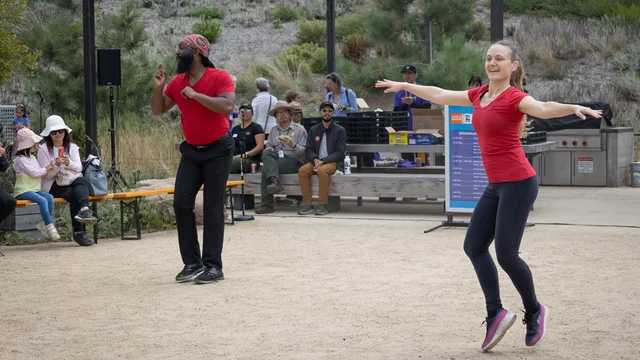 Performers dancing at Crissy Field Center in the Presidio of San Francisco for the Bay Area International Deaf Dance Festival