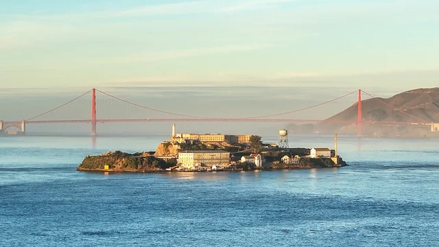 Aerial photograph of Alcatraz and the Golden Gate Bridge.
