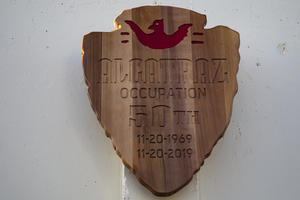 NPS arrowhead commemorating Alcatraz Occupation