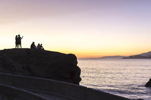 People enjoying the sunset from China Beach