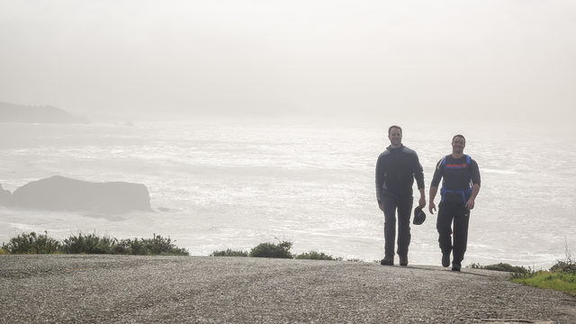 Visitors hike up the Coastal Trail from Rodeo Beach
