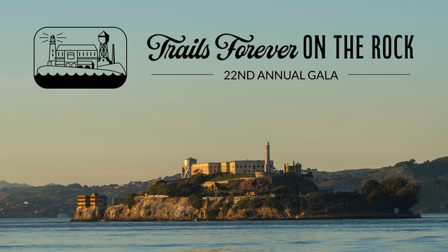 A view of Alcatraz Island with a text title reading Trails Forever on the Rock, 22nd annual Gala