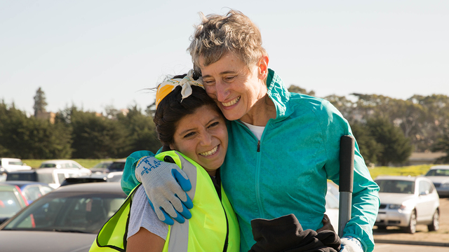 Secretary of the Interior Sally Jewell shares a joyful moment with Park Stewardship restoration intern Marcela Maldonado.