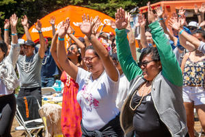 Hands in the air at the Give Back Kick Back