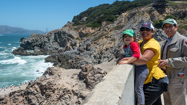 A family enjoys the view at Lands End