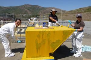 Volunteers re-painting structures at the Nike Missile Site in Marin.