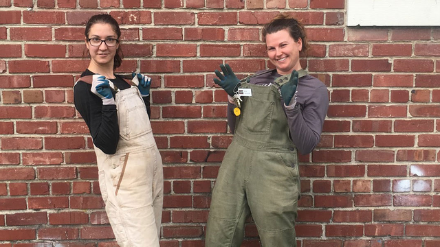 Two Park Stewardship Trail Crew members give big smiles for the camera