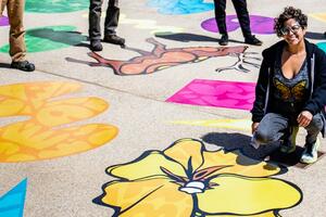 "Ancestral Futurism: Looking Back to Repair the Future" art installation by Favianna Rodriguez