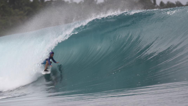 Penny Tibbetts surfing