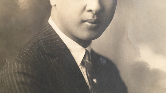 A sepia toned photograph from 1923 of Wallace Fong, a young Chinese-American man.