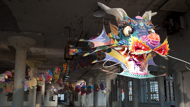 Colorful dragon suspended in an old Alcatraz prison building