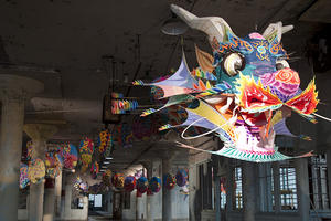 Colorful dragon suspended in an old Alcatraz prison building