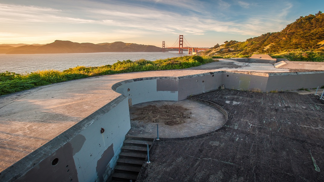 Image of a coastal battery with the Golden Gate Bridge in the distance