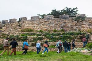 Group of hikers being guided by a Park Ranger