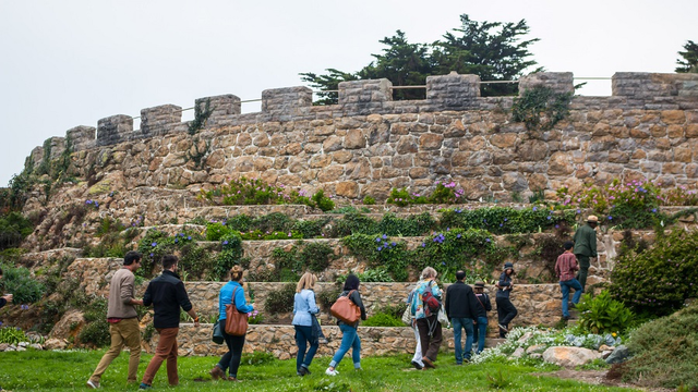 Group of hikers being guided by a Park Ranger