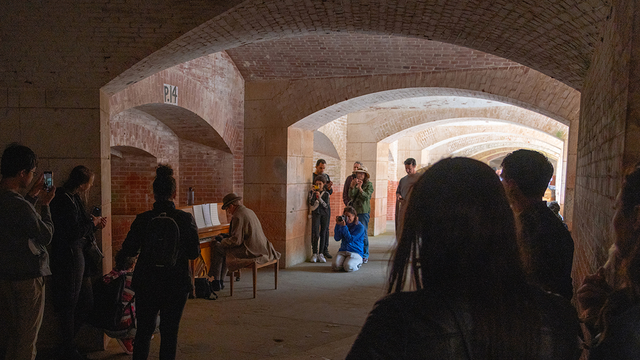 Pianist performing at Fort Point