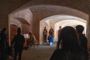 Pianist performing at Fort Point